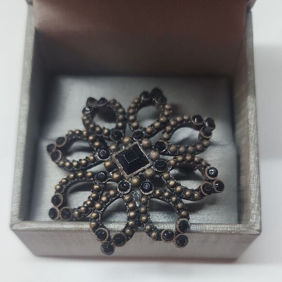Black and Brown Vintage Brooch with Intricate Snowflake Design - Picture 1 of 4